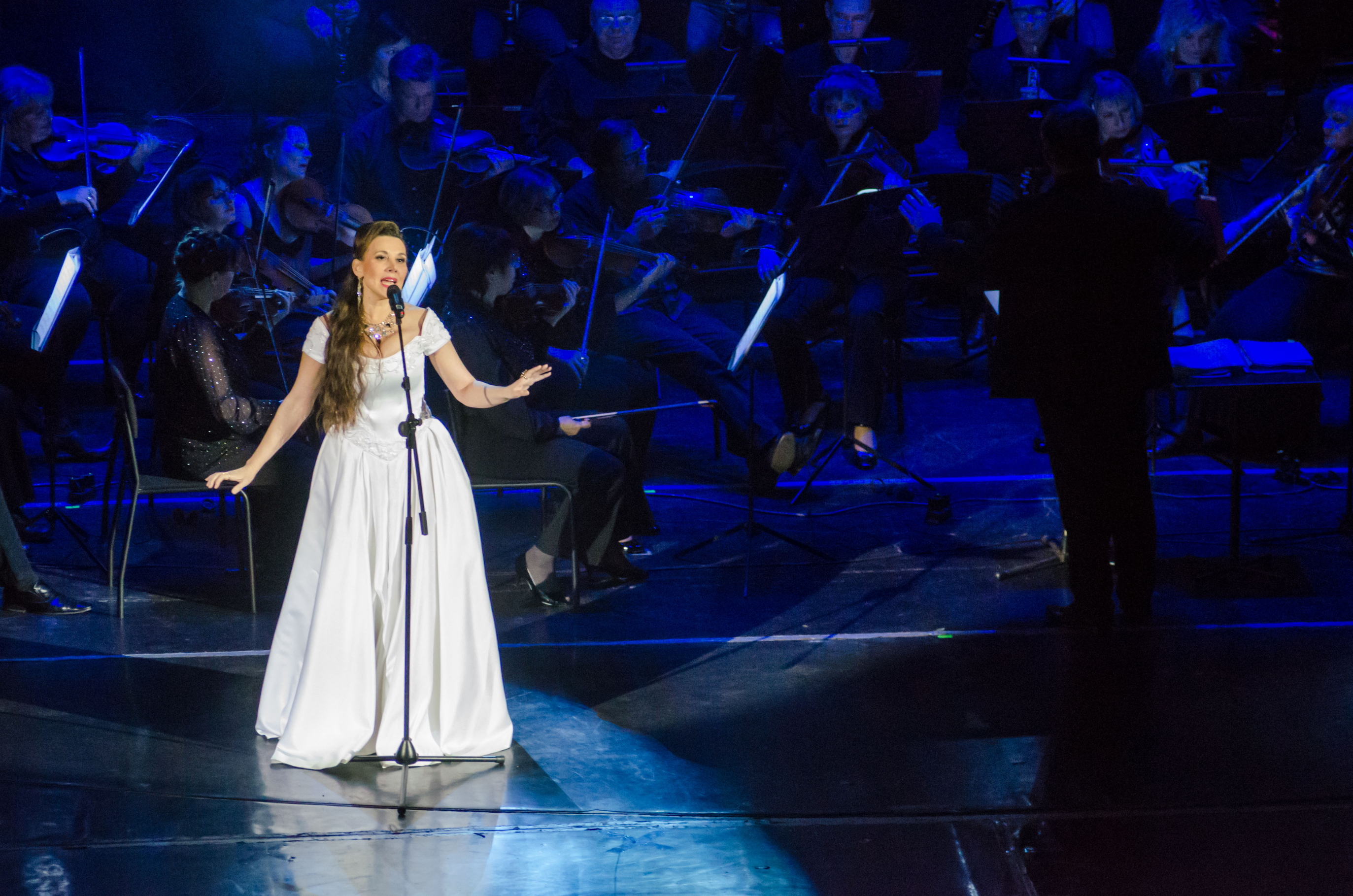 Singer performing with a symphony orchestra